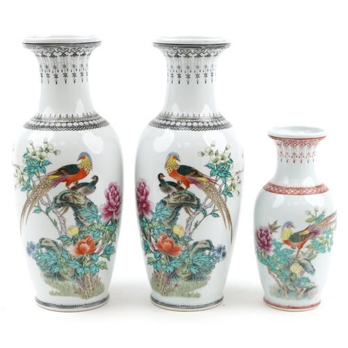 1590 - Three Chinese porcelain baluster vases including a pair, each hand painted with birds amongst flower... 