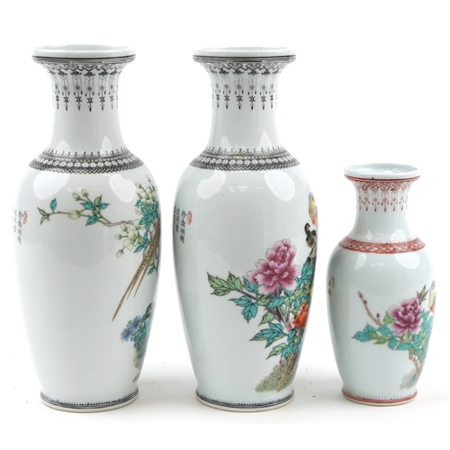 1590 - Three Chinese porcelain baluster vases including a pair, each hand painted with birds amongst flower... 