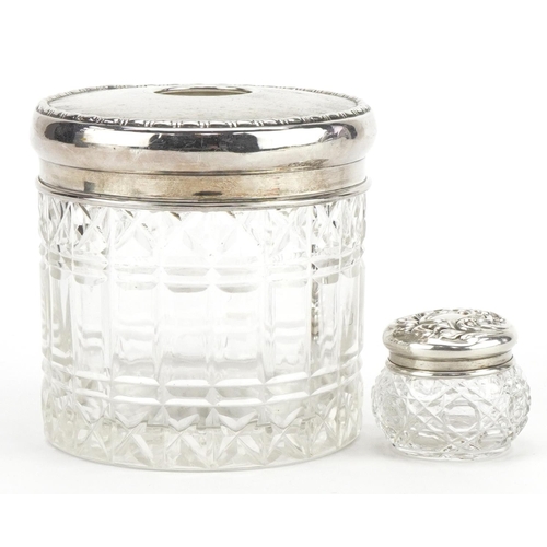 1710 - Two cut glass jars with silver lids including a tissue jar, the largest Birmingham 1942, 7.5cm high