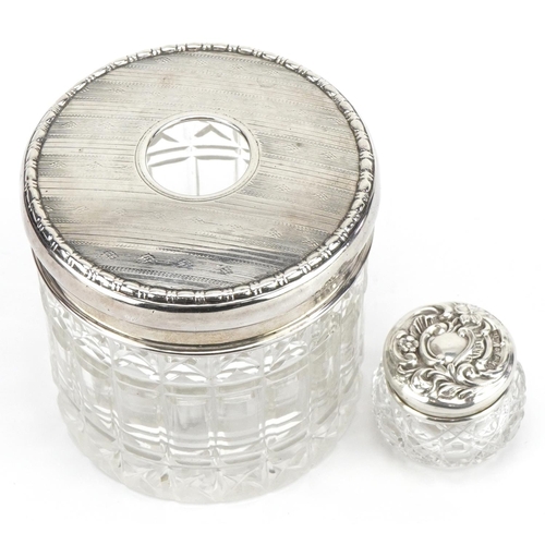 1710 - Two cut glass jars with silver lids including a tissue jar, the largest Birmingham 1942, 7.5cm high