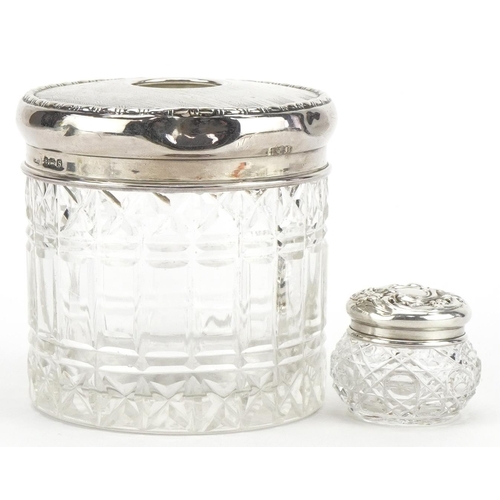 1710 - Two cut glass jars with silver lids including a tissue jar, the largest Birmingham 1942, 7.5cm high