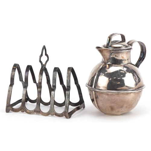 328 - Edwardian silver Jersey cream can and a silver four slice toast rack, the largest 8.5cm high, total ... 