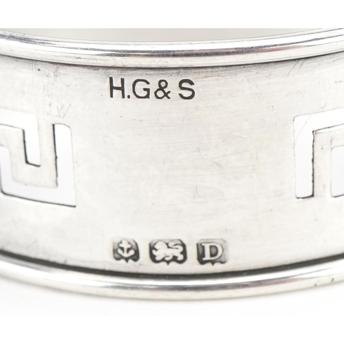 201 - Seven Victorian and later silver napkin rings, various hallmarks, the largest 4.8cm wide, total 162.... 