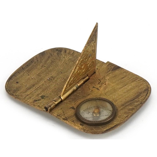 178 - Victorian chased gilt metal folding pocket sundial with inset compass by J Baum & Co of Birmingham d... 