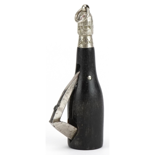 1490 - Victorian horn cigar cutter in the form of a Champagne bottle, impressed lozenge mark and numbered 4... 