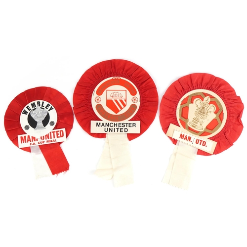 1285 - Three footballing interest Manchester United rosettes including FA Cup final at Wembley