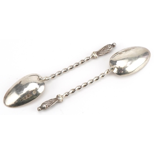 243 - William Hutton & Sons Ltd, set of six Edwardian silver apostle teaspoons and sugar tongs housed in a... 