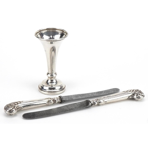 1612 - Miniature silver trumpet shaped bud vase and a pair of silver handled pistol grip butter knives by M... 