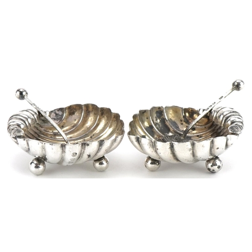 391 - William Henry Lever, pair of Victorian silver shell shaped open salts with spoons, Birmingham 1894, ... 