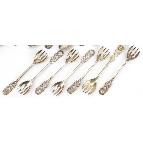 356 - Eighteen 800 grade silver forks and spoons with naturalistic terminals, 12.5cm in length, 290.0g