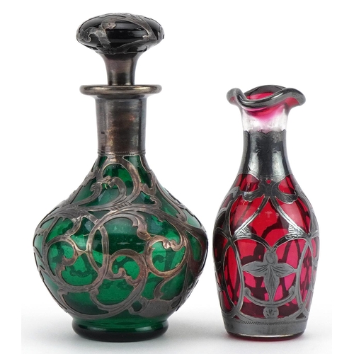 1631 - Silver overlaid ruby glass vase and a silver overlaid green glass scent bottle, the largest 11cm hig... 