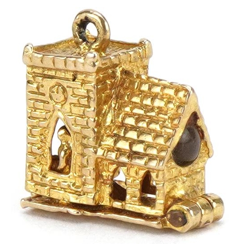 2064 - 9ct gold opening church charm, 1.4cm wide, 2.9g