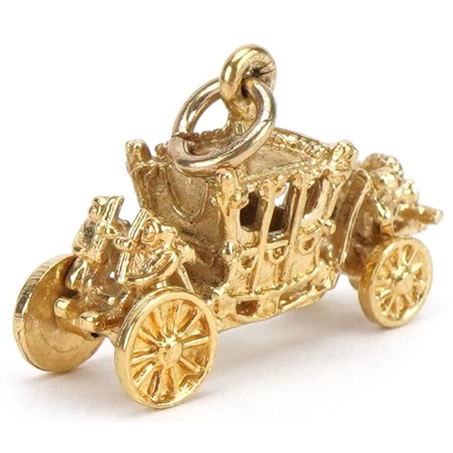 2096 - 9ct gold coronation coach charm, 2.1cm in length, 3.1g