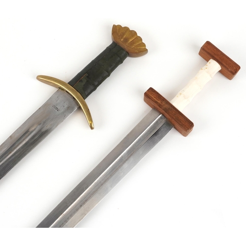 718 - Two Medieval style broad swords, the largest 98.5cm in length