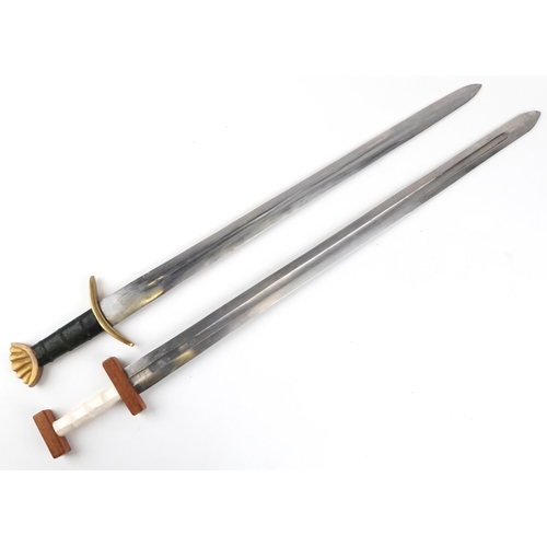 718 - Two Medieval style broad swords, the largest 98.5cm in length