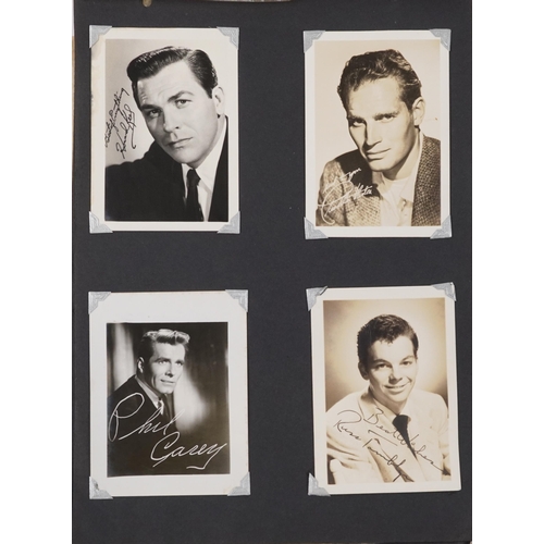 919 - Collection of screen star black and white photographs and facsimile signatures arranged in an album