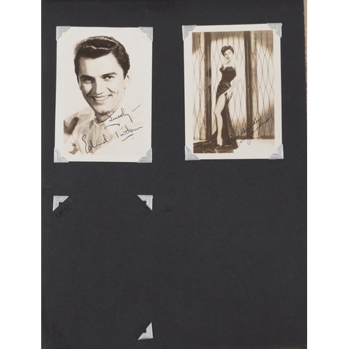 919 - Collection of screen star black and white photographs and facsimile signatures arranged in an album