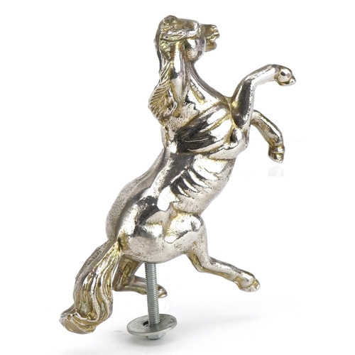 72 - Automobilia interest silver plated car mascot in the form of a rearing horse, 16cm high