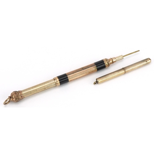 139 - Two Victorian gold plated propelling pencils including one with black enamel, the largest 6cm in len... 