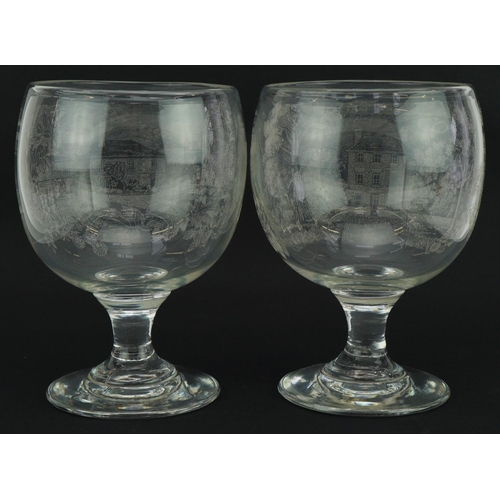 1575 - Pair of antique glass pedestal vases etched with a Georgian house and cottage, each 21.5cm high