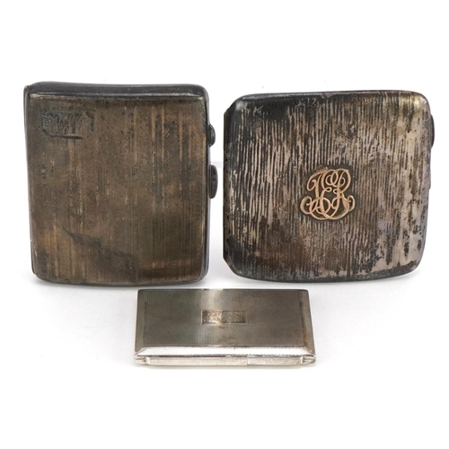 99 - Two Edwardian and later silver cigarette cases and an engine turned silver compact, the largest 8.5c... 