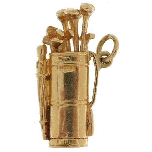 2112 - 9ct gold golf caddy and clubs charm, 2.5cm high, 3.9g