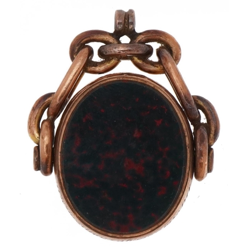 2093 - Victorian 9ct rose gold bloodstone and carnelian spinner fob engraved Presented to David George Thom... 