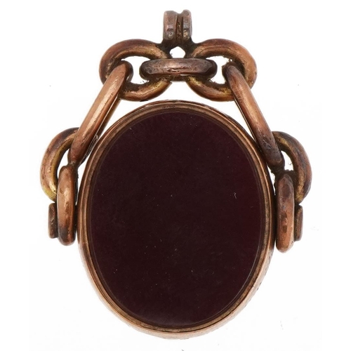 2093 - Victorian 9ct rose gold bloodstone and carnelian spinner fob engraved Presented to David George Thom... 