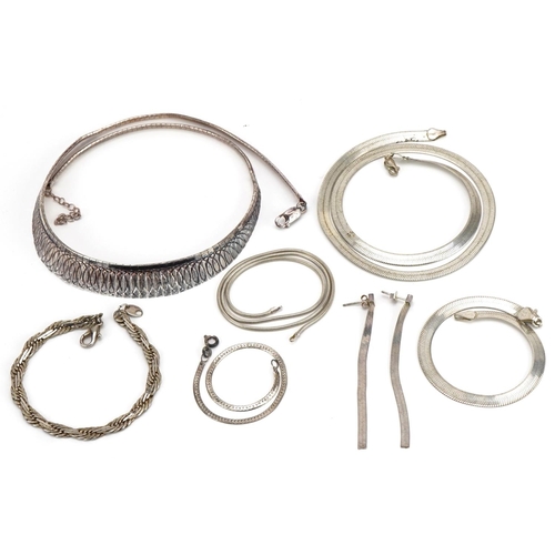 2591 - Collection of silver flat link necklaces, bracelets and pair of earrings, the largest 45cm in length... 