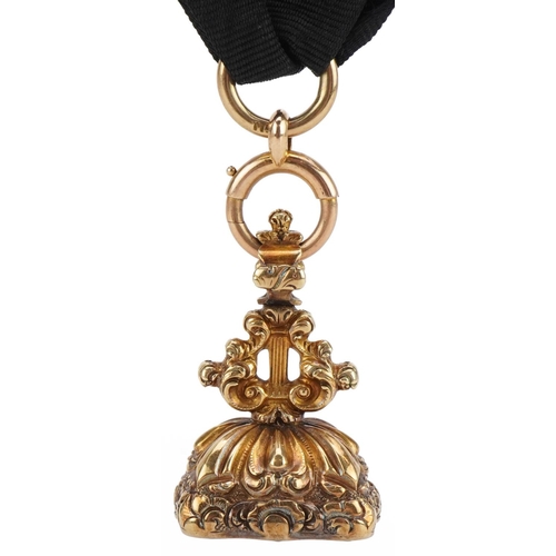 2073 - Victorian unmarked gold hardstone fob on a silk ribbon with 15ct gold mounts, overall 18cm in length... 