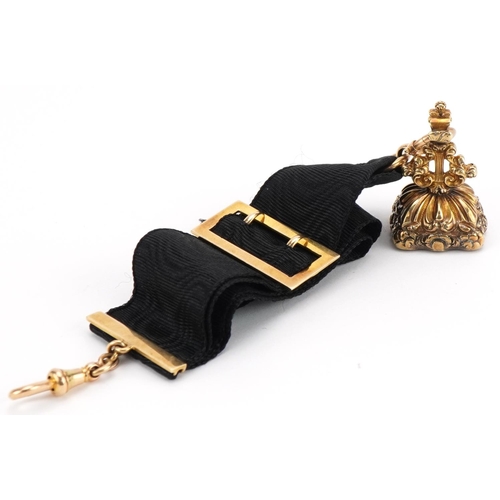 2073 - Victorian unmarked gold hardstone fob on a silk ribbon with 15ct gold mounts, overall 18cm in length... 