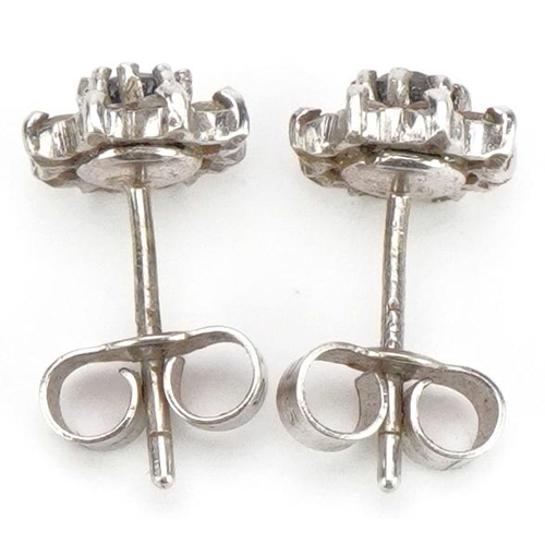 2190 - Pair of 9ct white gold sapphire and diamond flower head earrings, 7.5mm in diameter, 1.3g