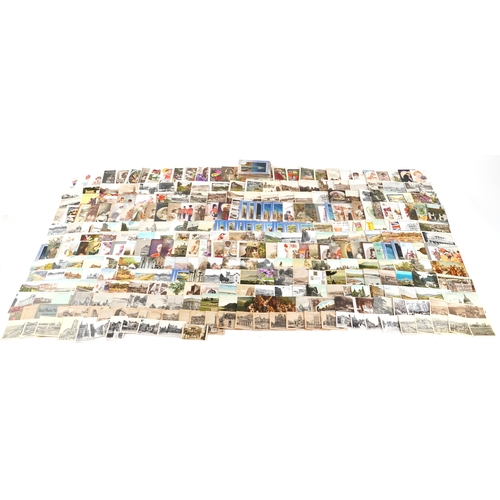 924 - Collection of predominantly topographical postcards including street scenes and royal progress throu... 