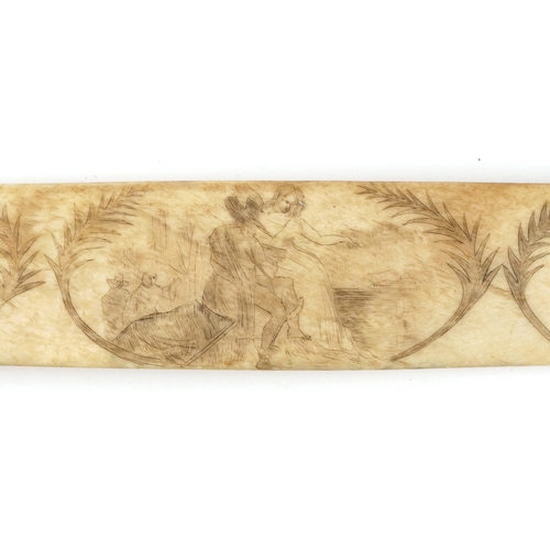 180 - Antique sailor's scrimshaw whale bone page turner carved with figures and rigged ship, 36cm wide