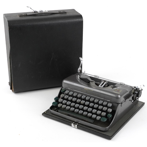 1545 - Vintage Imperial typewriter with case