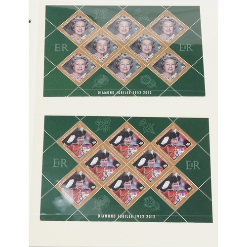 962 - Collection of Elizabeth II Diamond Jubilee mint stamps arranged in an album