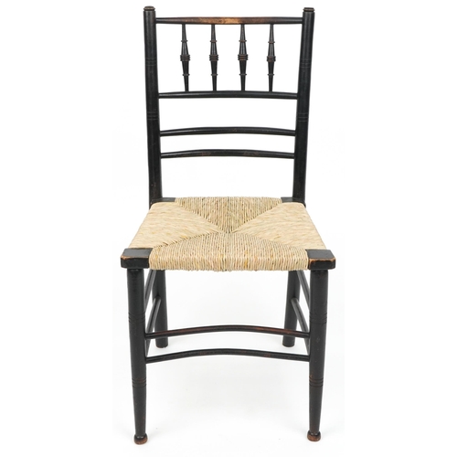 1089 - Attributed to Philip Webb for Morris & Co, Arts & Crafts ebonised Sussex chair retailed by Liberty o... 