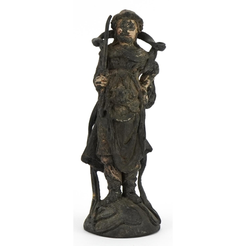 1492 - Chinese lacquered cast metal figure of a warrior with remnants of gilding and paint, 20cm high