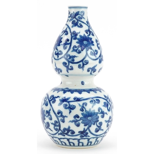 1375 - Chinese blue and white porcelain double gourd vase hand painted with flower heads amongst scrolling ... 