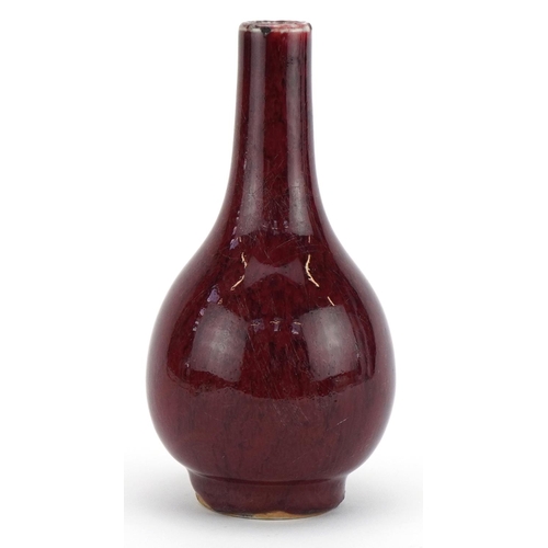 1505 - Chinese porcelain vase having a sang de boeuf glaze, 15cm high