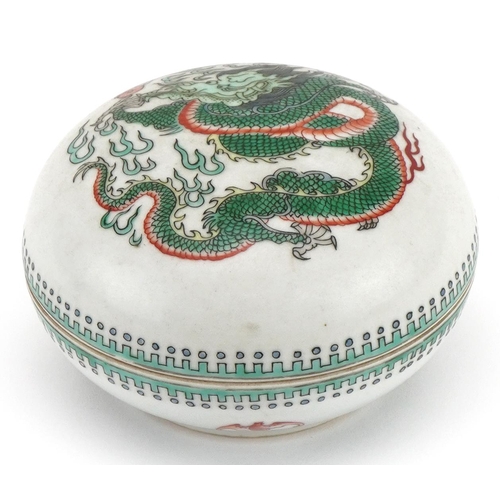 1651 - Chinese porcelain bun box and cover hand painted in the famille verte palette with a dragon chasing ... 