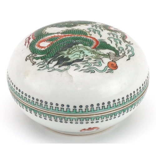 1651 - Chinese porcelain bun box and cover hand painted in the famille verte palette with a dragon chasing ... 