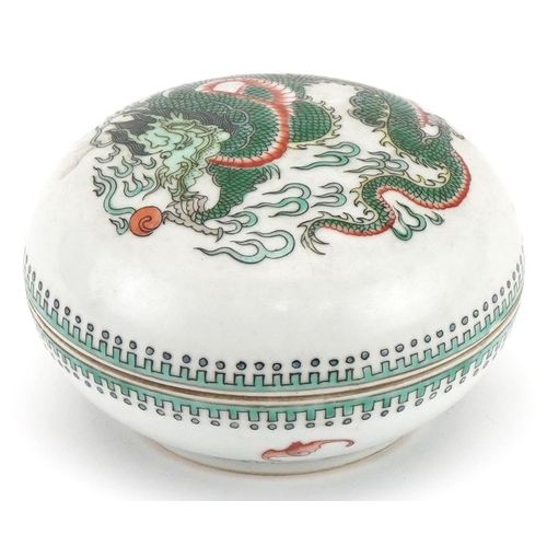 1651 - Chinese porcelain bun box and cover hand painted in the famille verte palette with a dragon chasing ... 