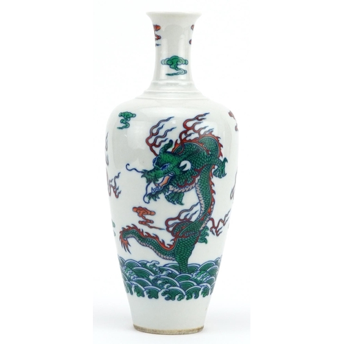 1707 - Chinese wucai porcelain vase hand painted with dragons chasing the flaming pearl amongst clouds, six... 