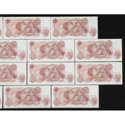 857 - Fourteen Elizabeth II Bank of England ten shilling banknotes with consecutive serial numbers, C23N 0... 