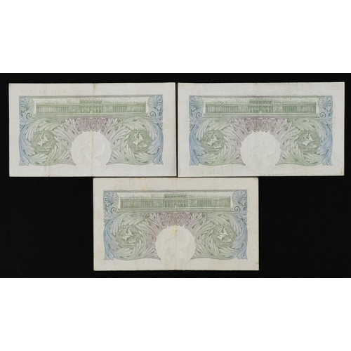 851 - Three Bank of England one pound notes, Chief Cashiers C P Mahon and B S Catterns, various serial num... 