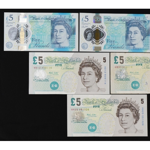 853 - Six Elizabeth II Bank of England five pound notes including two with consecutive serial numbers