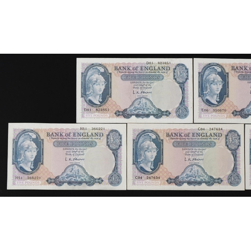 852 - Five Bank of England five pound notes, each Chief Cashier L K O'Brien, various serial numbers