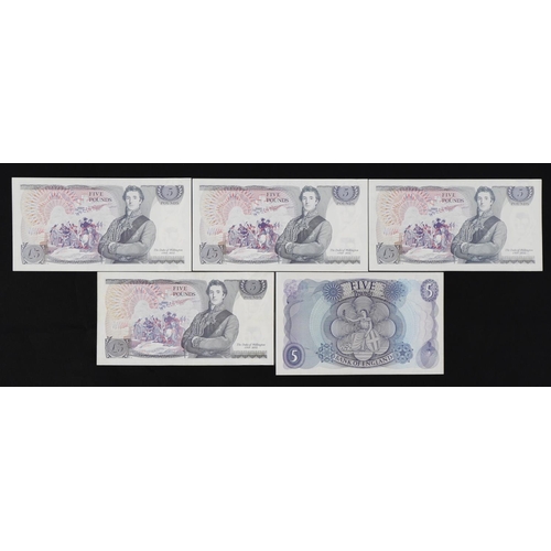 860 - Five Elizabeth II Bank of England five pound banknotes, three with consecutive serial numbers compri... 