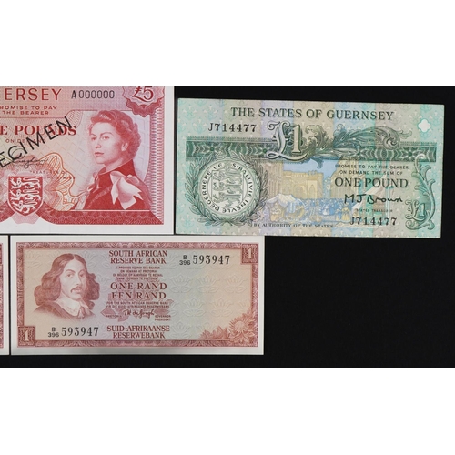 876 - Banknotes including States of Jersey five pound specimen note and States of Guernsey one pound